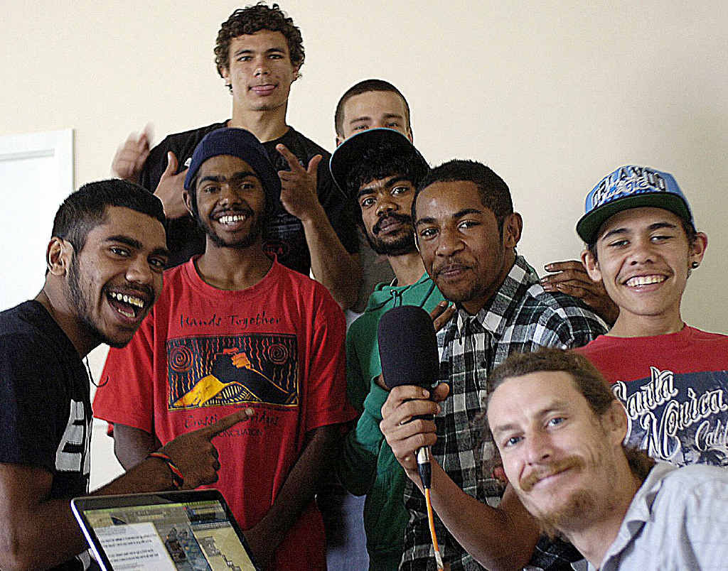 TUNING IN: Kids from the Ngulangah education program recording an election rap for Triple J with MC Dingo (aka Mark Robertson). TUNING IN: Kids from the Ngulangah education program recording an election rap for Triple J with MC Dingo (aka Mark Robertson).